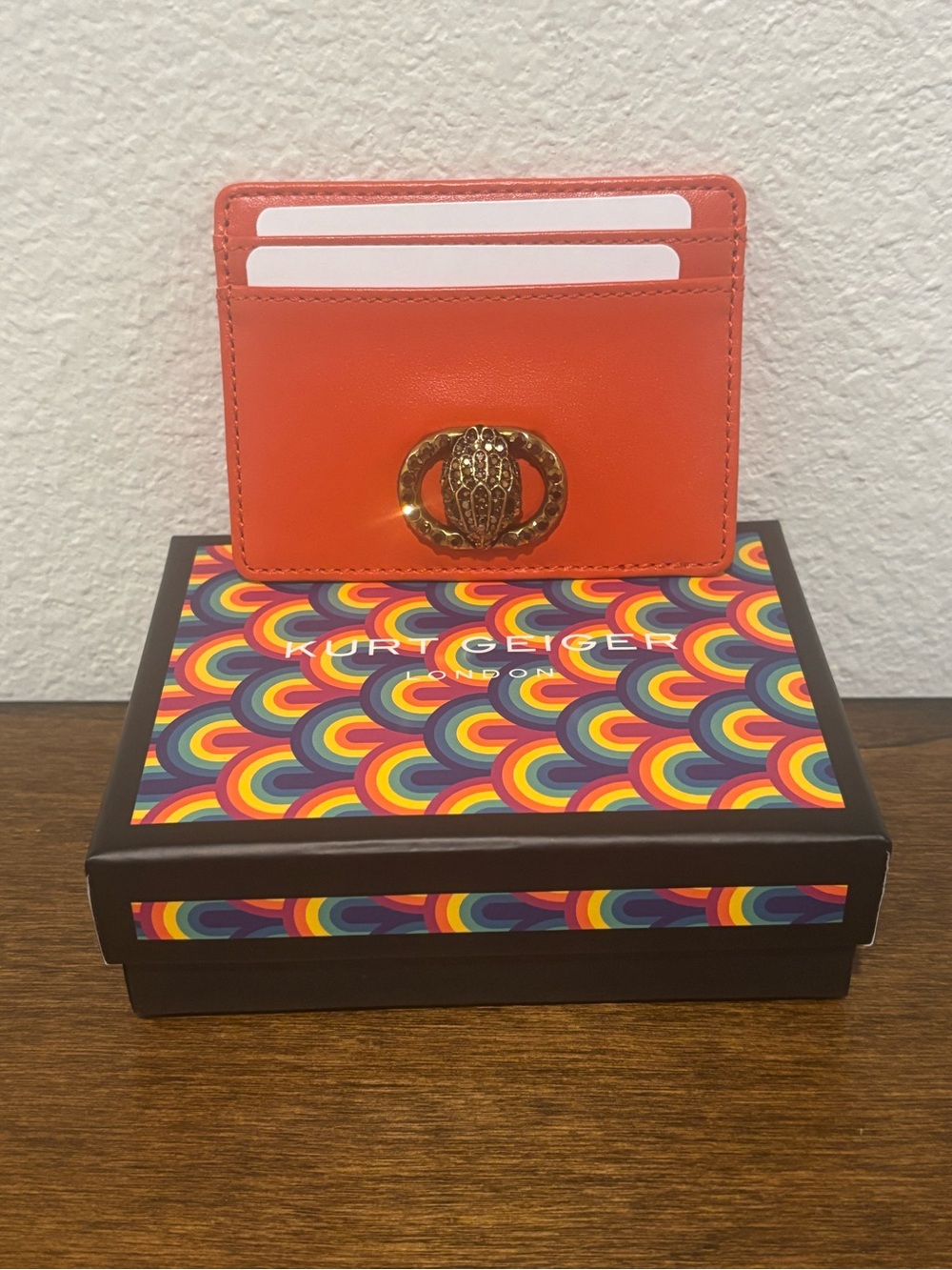 Kurt Geiger Coral-Orange Leather Cardholder with Gold Bee Motif